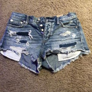 Distressed denim shorts